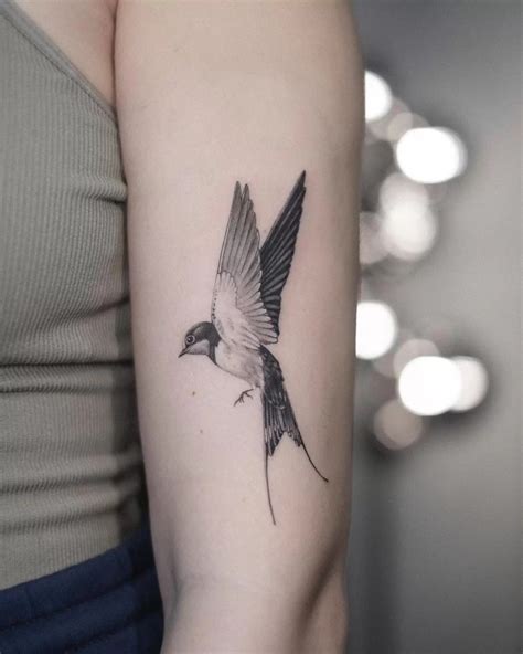 meaning of the swallow tattoo|Swallow Tattoos: Delving Into The Depths Of An .